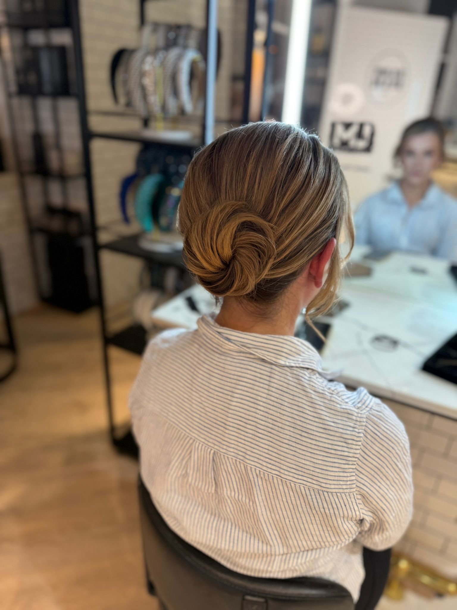Low twisted chignon for the bridesmaid lunch